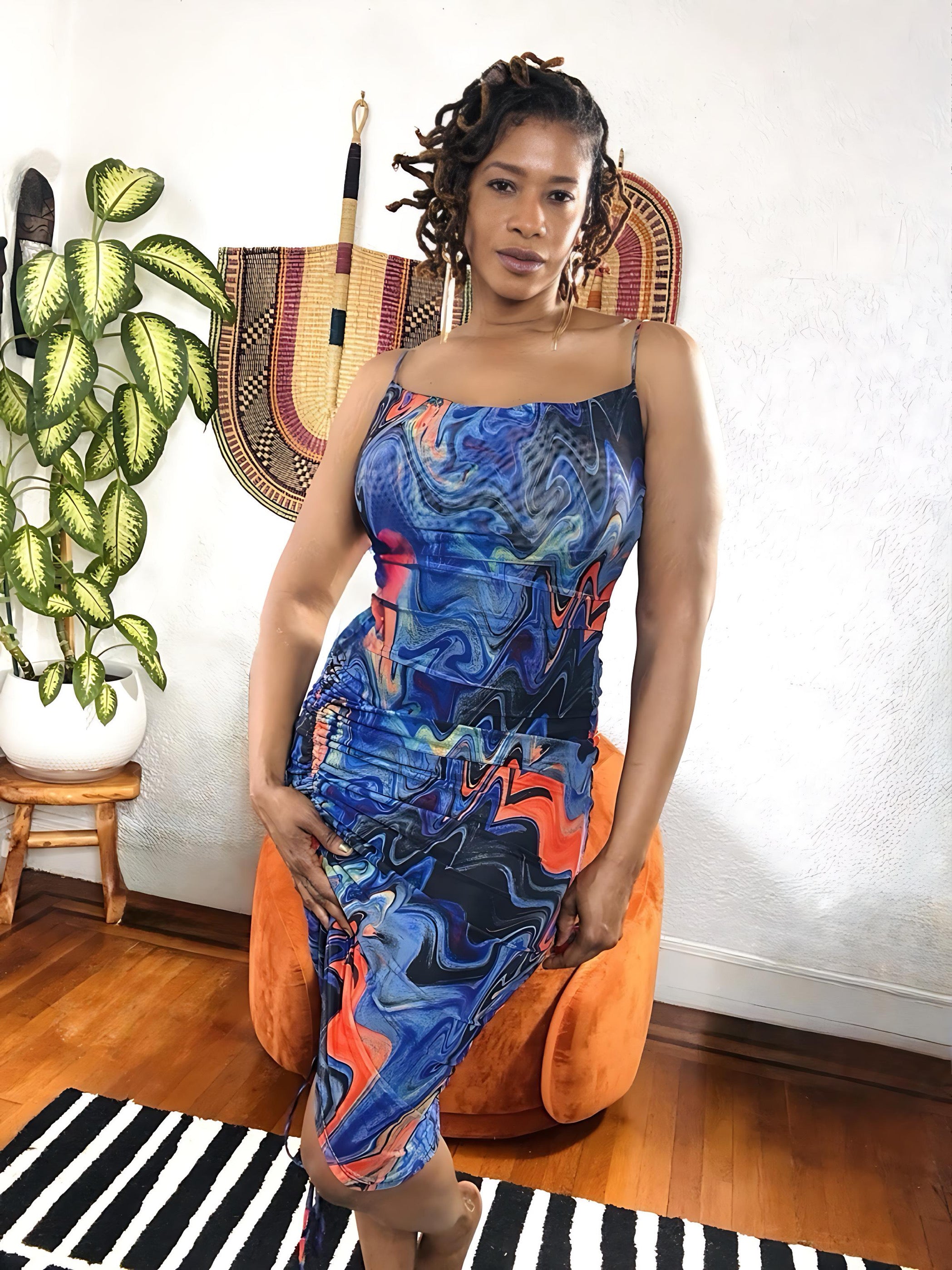  Model wearing the Electric Flow – Abstract Marble Dress from MonologueClosets — bold marble print and curve-hugging silhouette that radiates confidence.