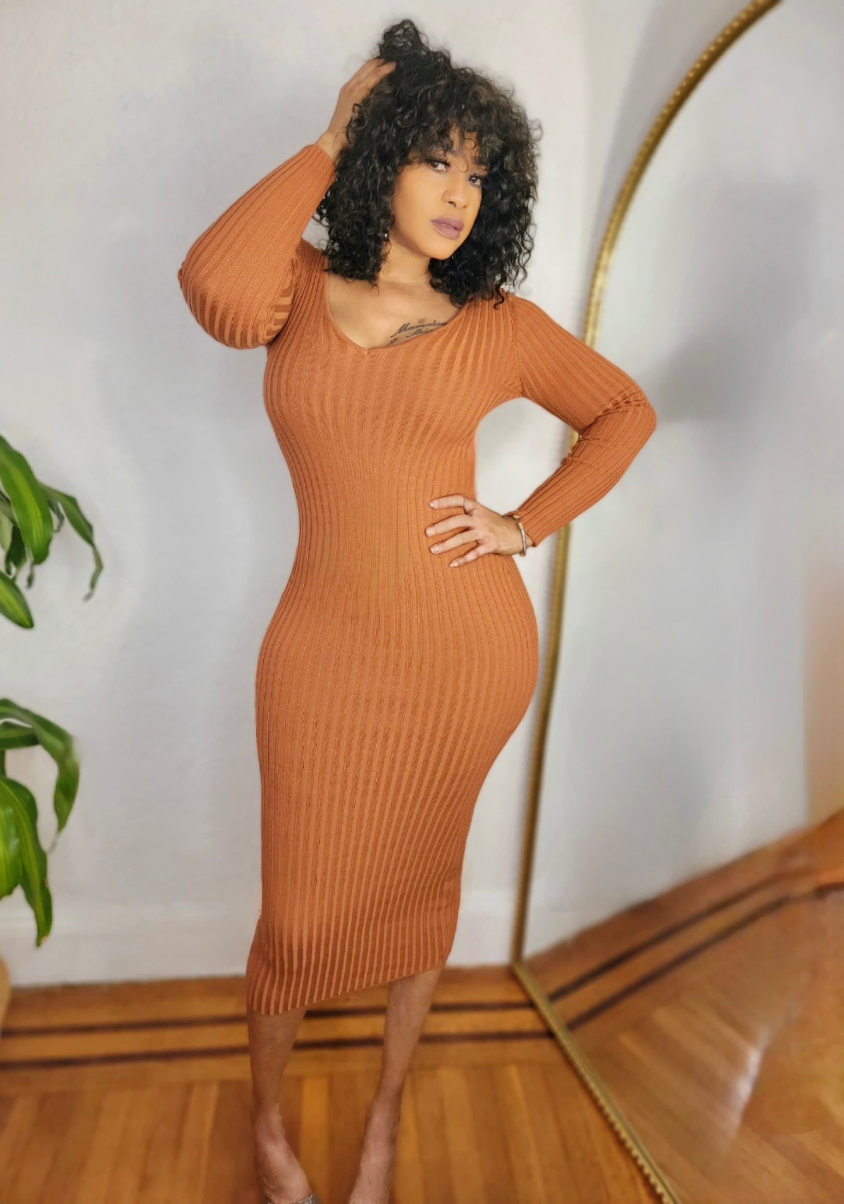 Close-up of the scoop neckline and ribbed texture.