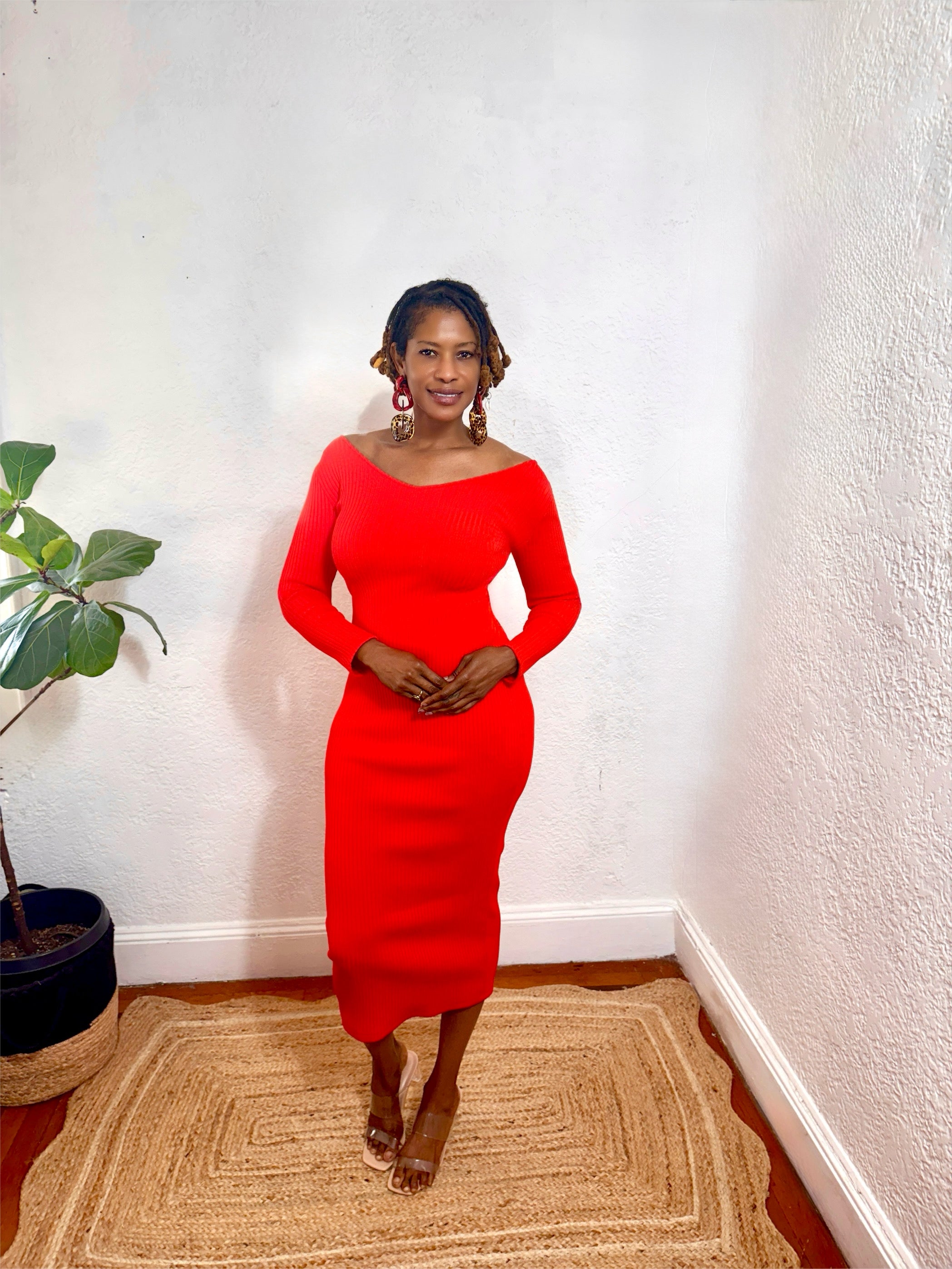 Side view of the Citrine Glow Ribbed Midi Dress showing flattering fit and smooth ribbed texture.