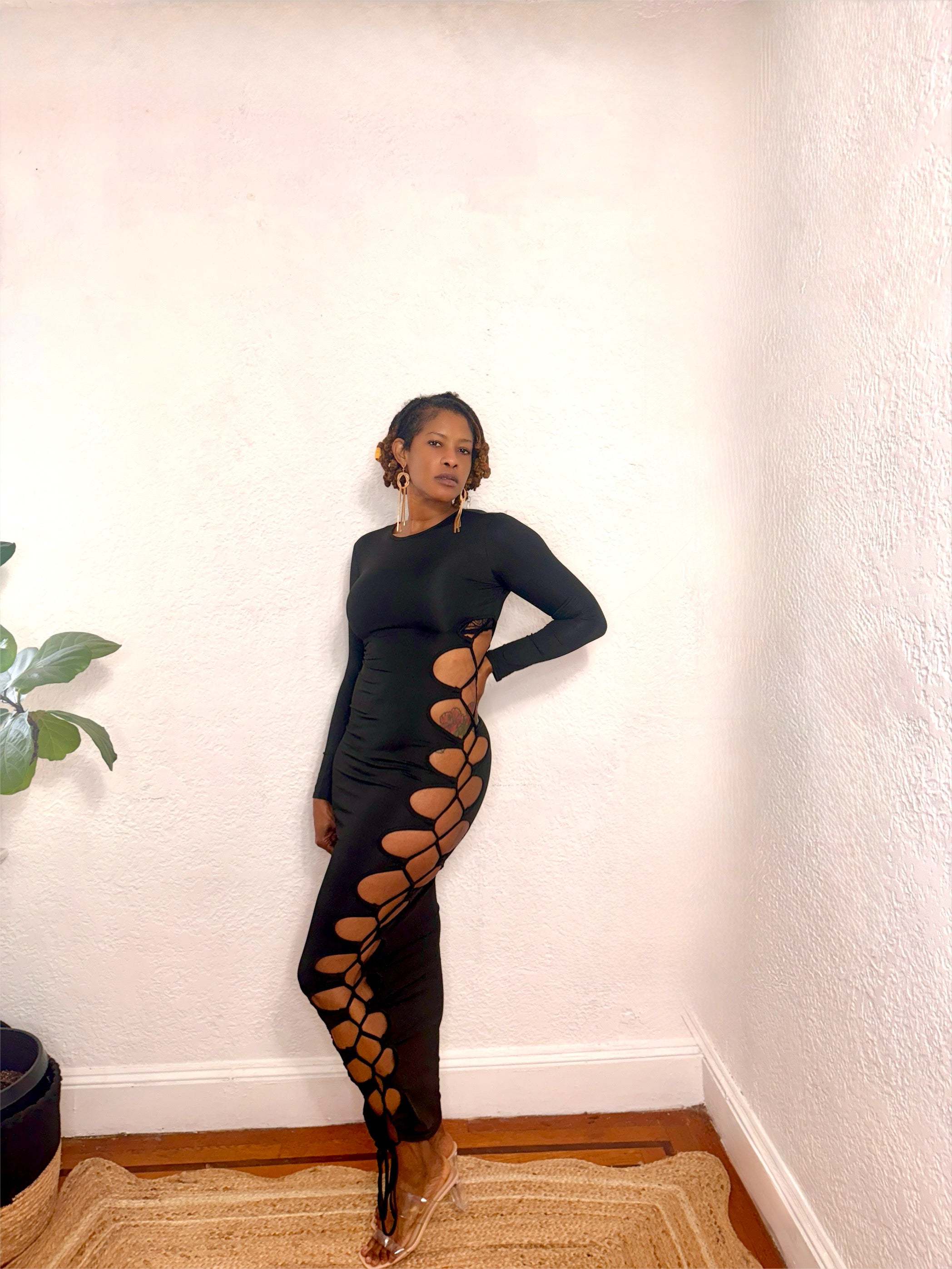 Close-up of the side cutouts and soft stretch fabric of the Danger Curve Cutout Maxi Dress.