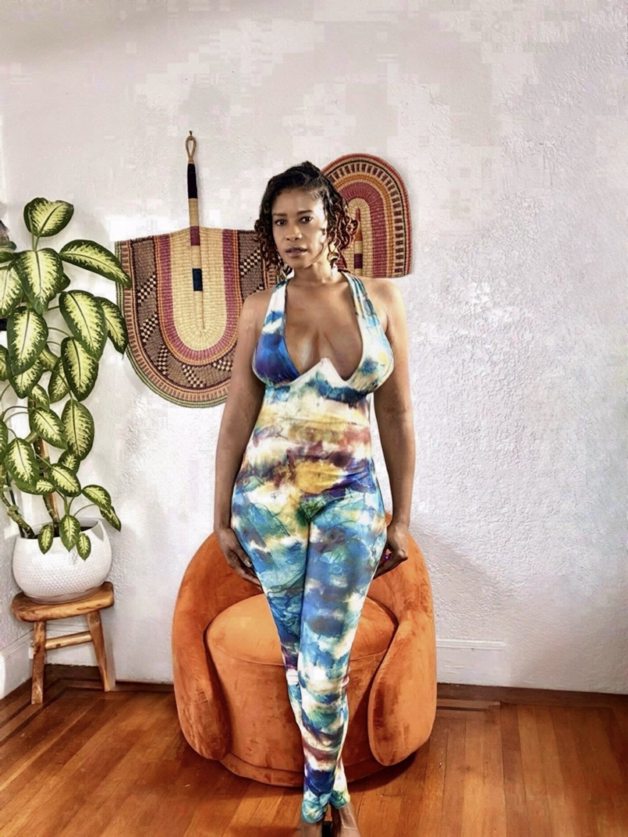 Full-length view of the Earth Goddess Jumpsuit featuring wide-leg design and elegant, casual-chic look.