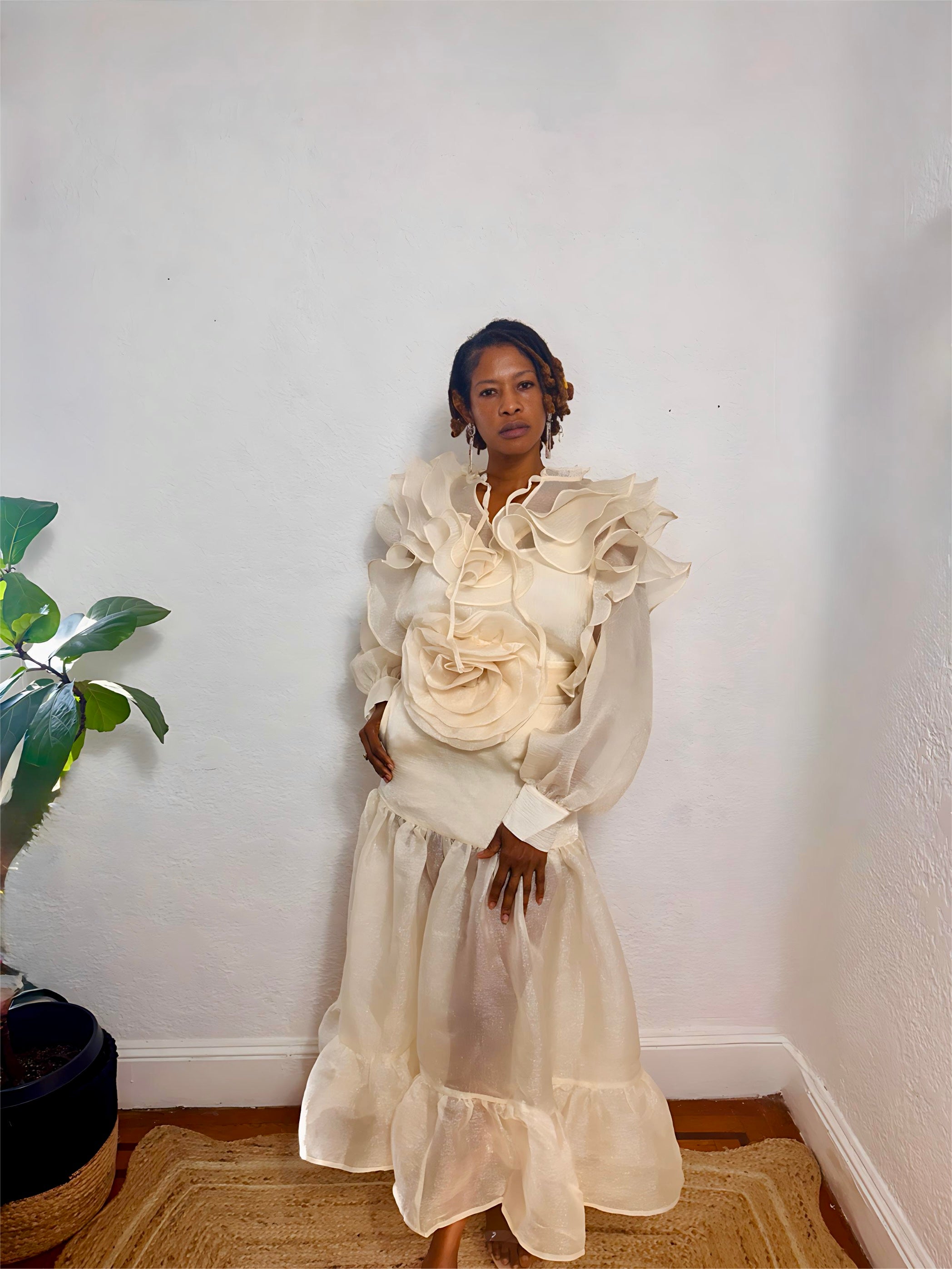 Full-length photo of the French Vanilla Ethereal Bloom Set styled with gold accessories.