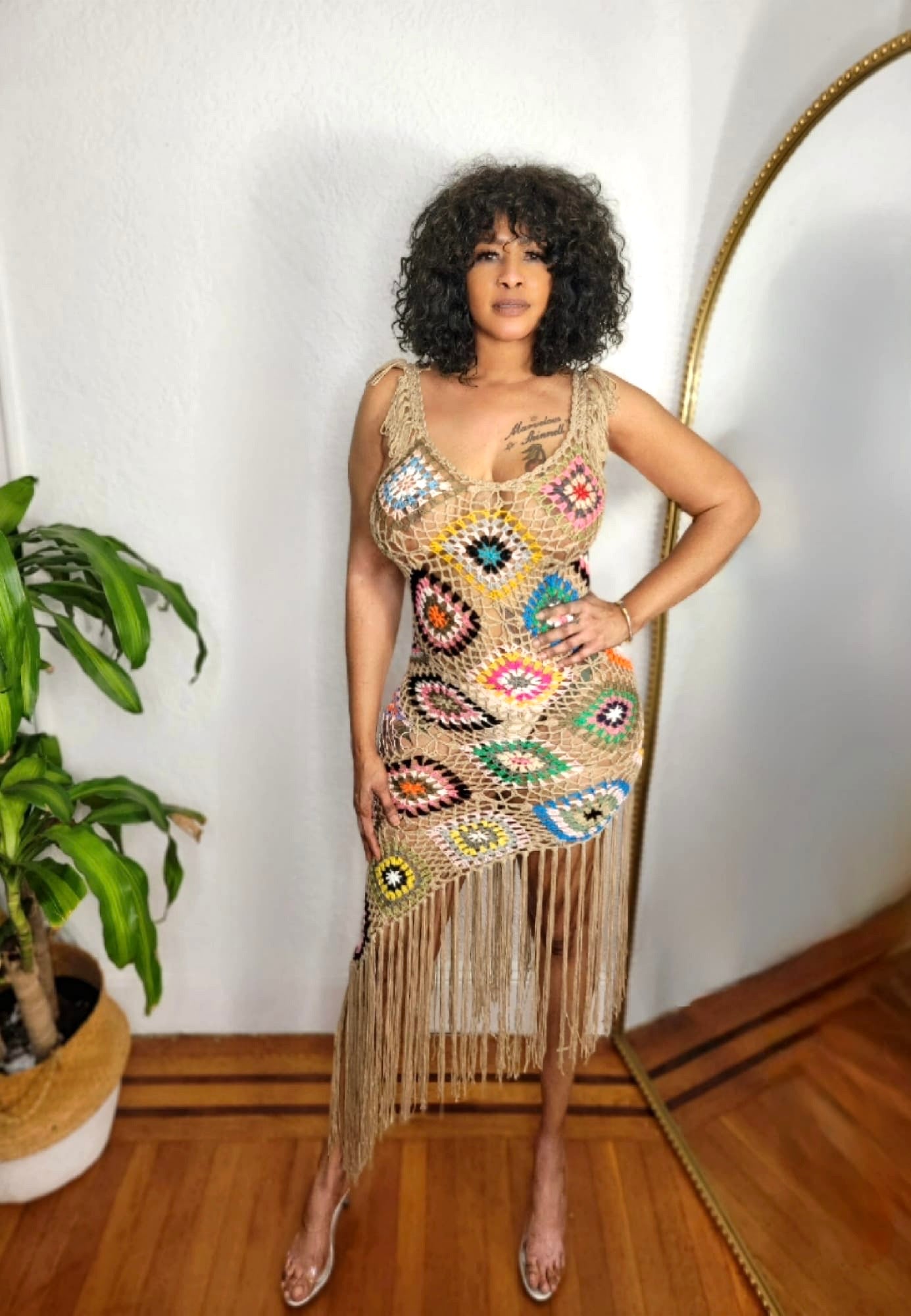 Side view of the Island Goddess Crochet Dress showing the crochet texture and figure-hugging silhouette.