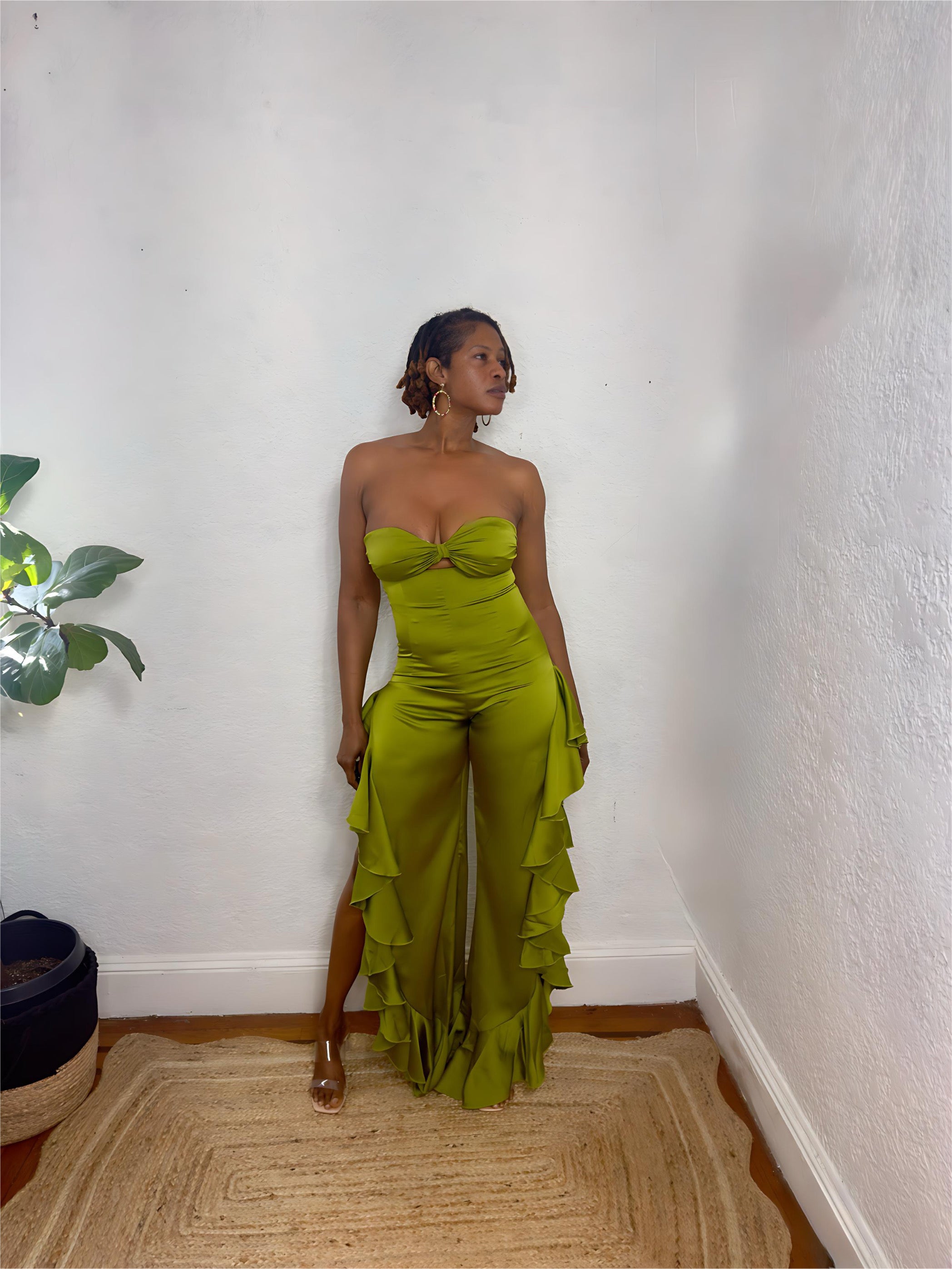 Escape into elegance with the Island Temptress Jumpsuit — a tropical-inspired statement piece designed to flatter every curve. Featuring a flowy silhouette, luxe fabric, and vacation-ready energy. Shop Monologue Closets for your next getaway look.