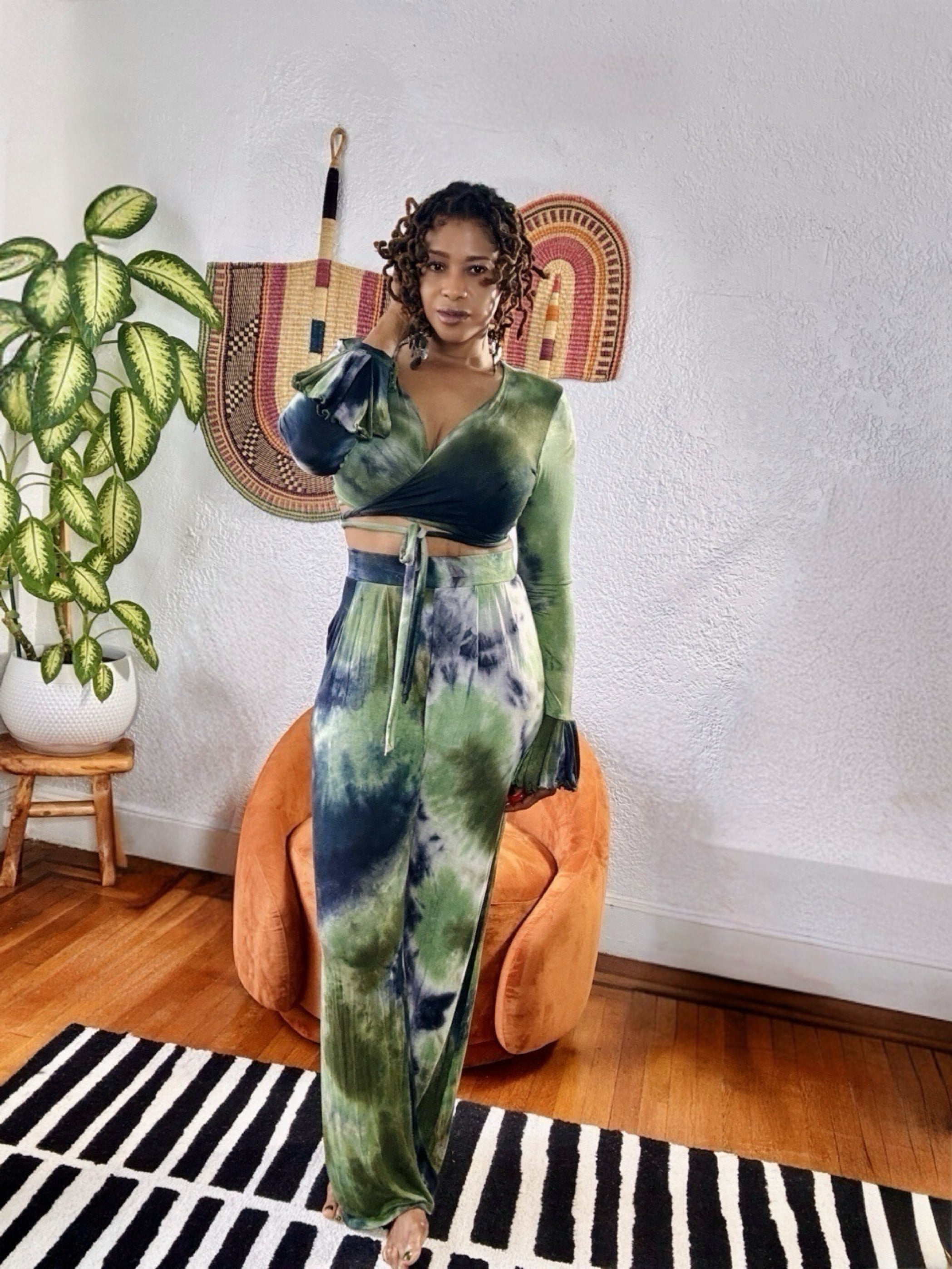 Side view of the Jungle Aura 2-Piece Set showing flowy wide-leg fit and bold tie-dye pattern.