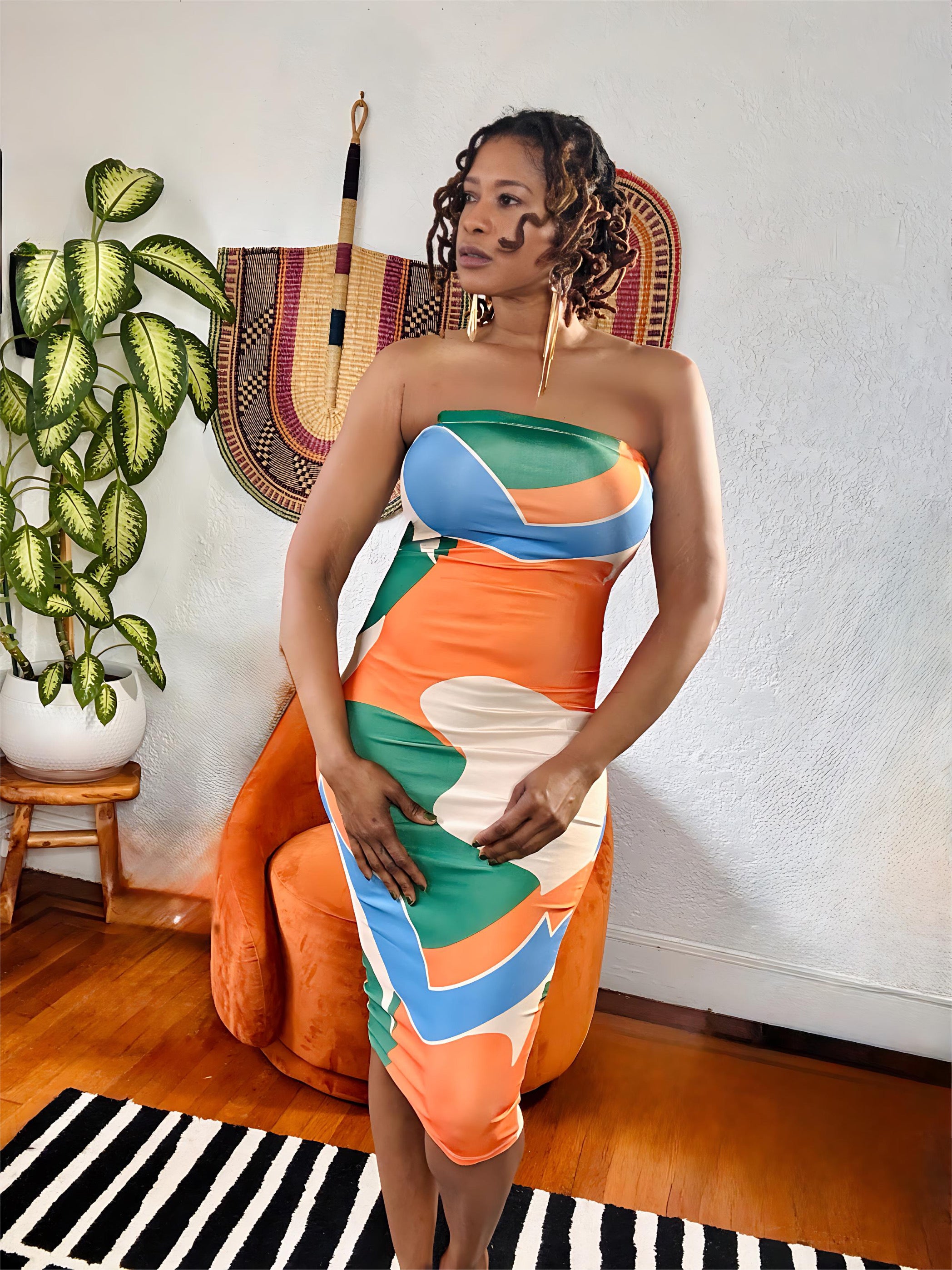 view of Mood Swing Maxi Dress emphasizing curve-sculpting fit and modern design.