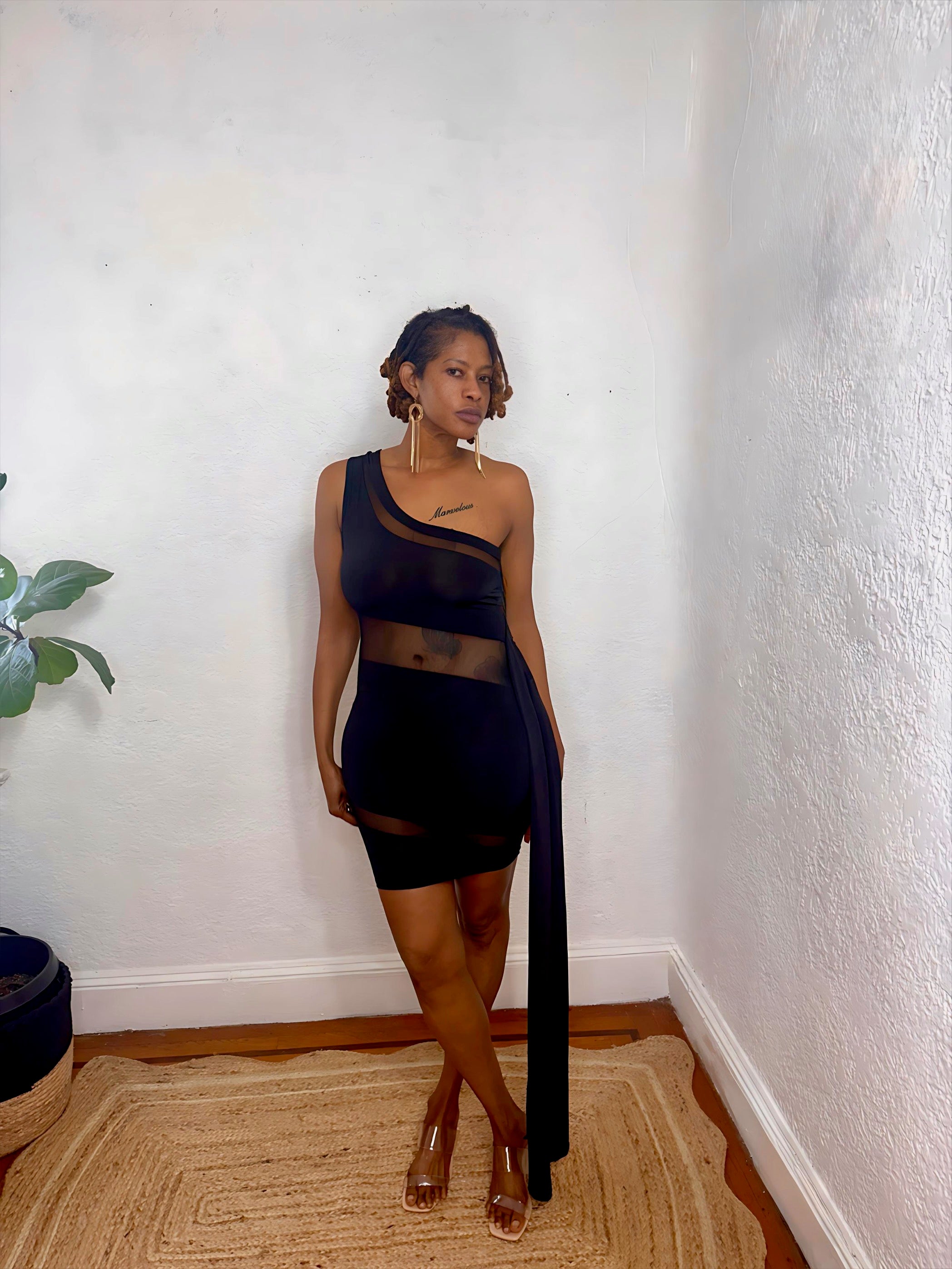 Front view of the Nightfall One-Shoulder Dress showing asymmetrical neckline and curve-defining design.