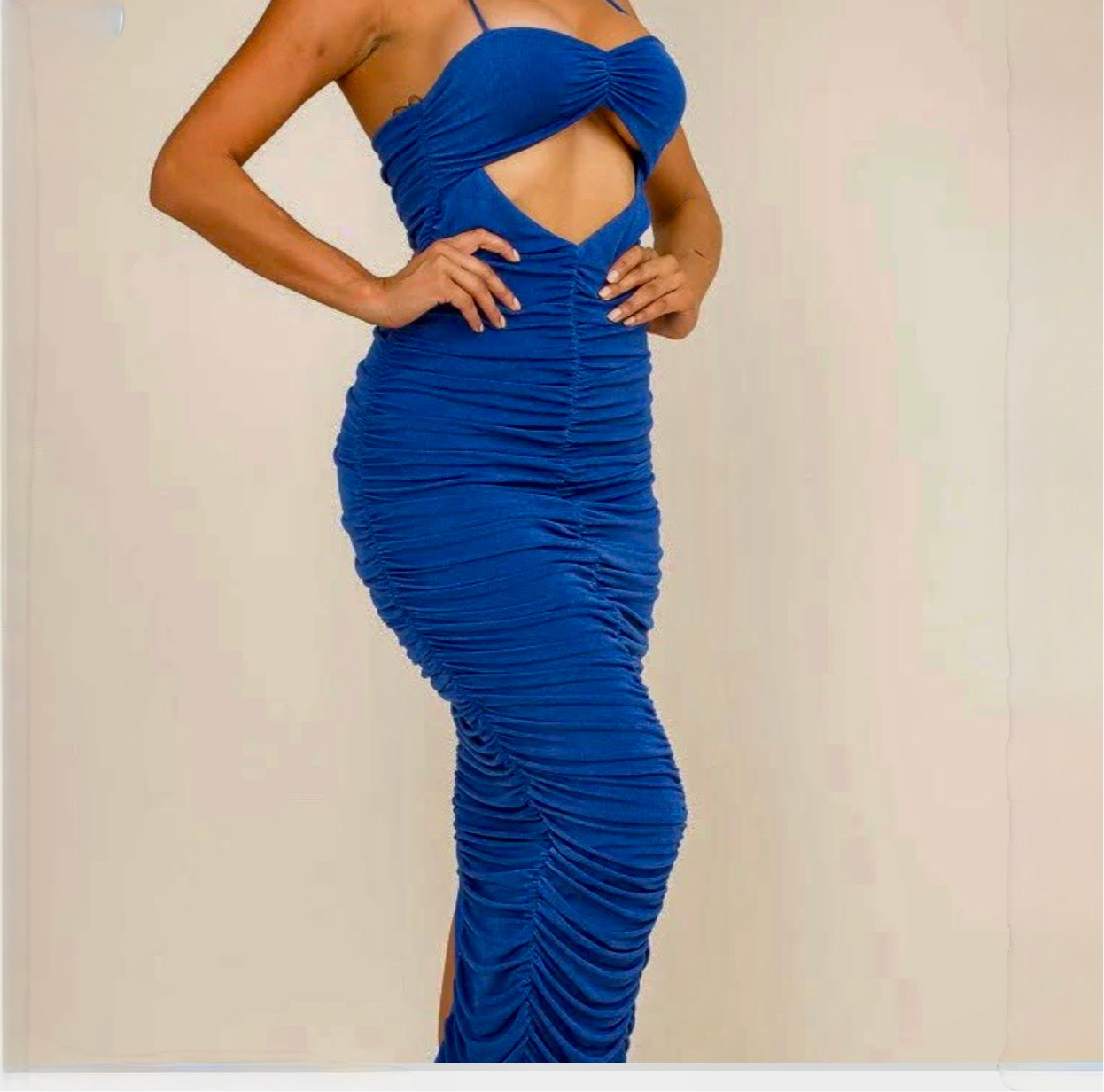 Close-up of cut-out bust and stretch bodycon fabric.