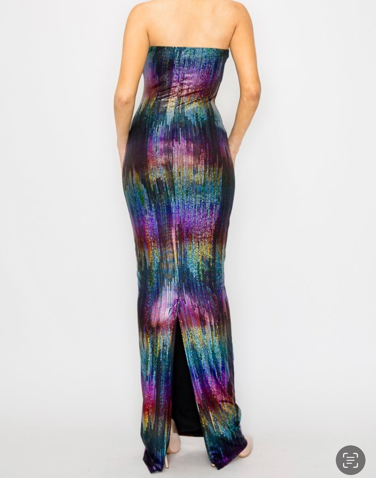 Back view of the Scandal Shimmer Dress revealing its smooth stretch fit and soft sheen for a modern, statement-ready vibe.