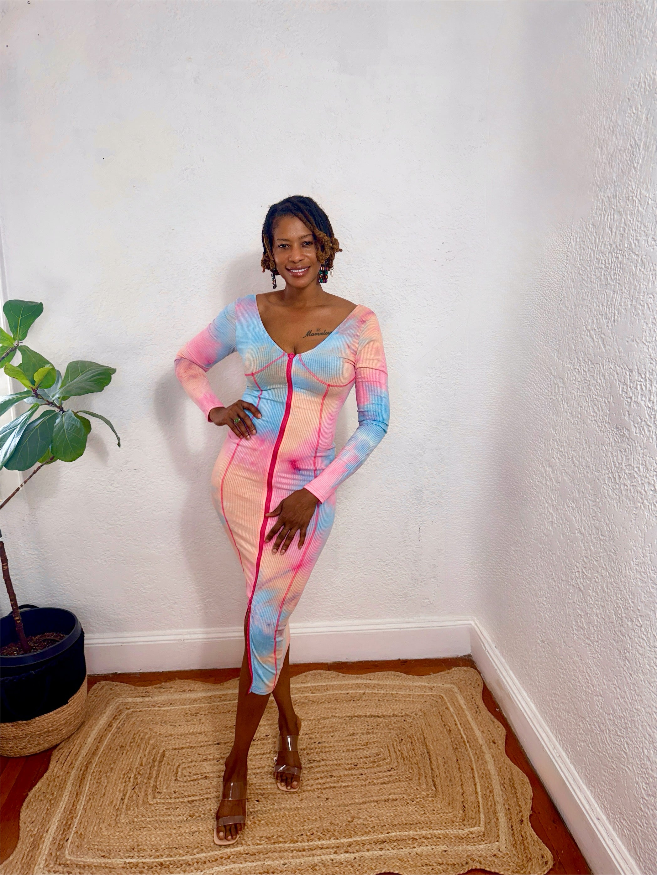 Full-length photo of the Zipline Curve Dress styled with nude heels.