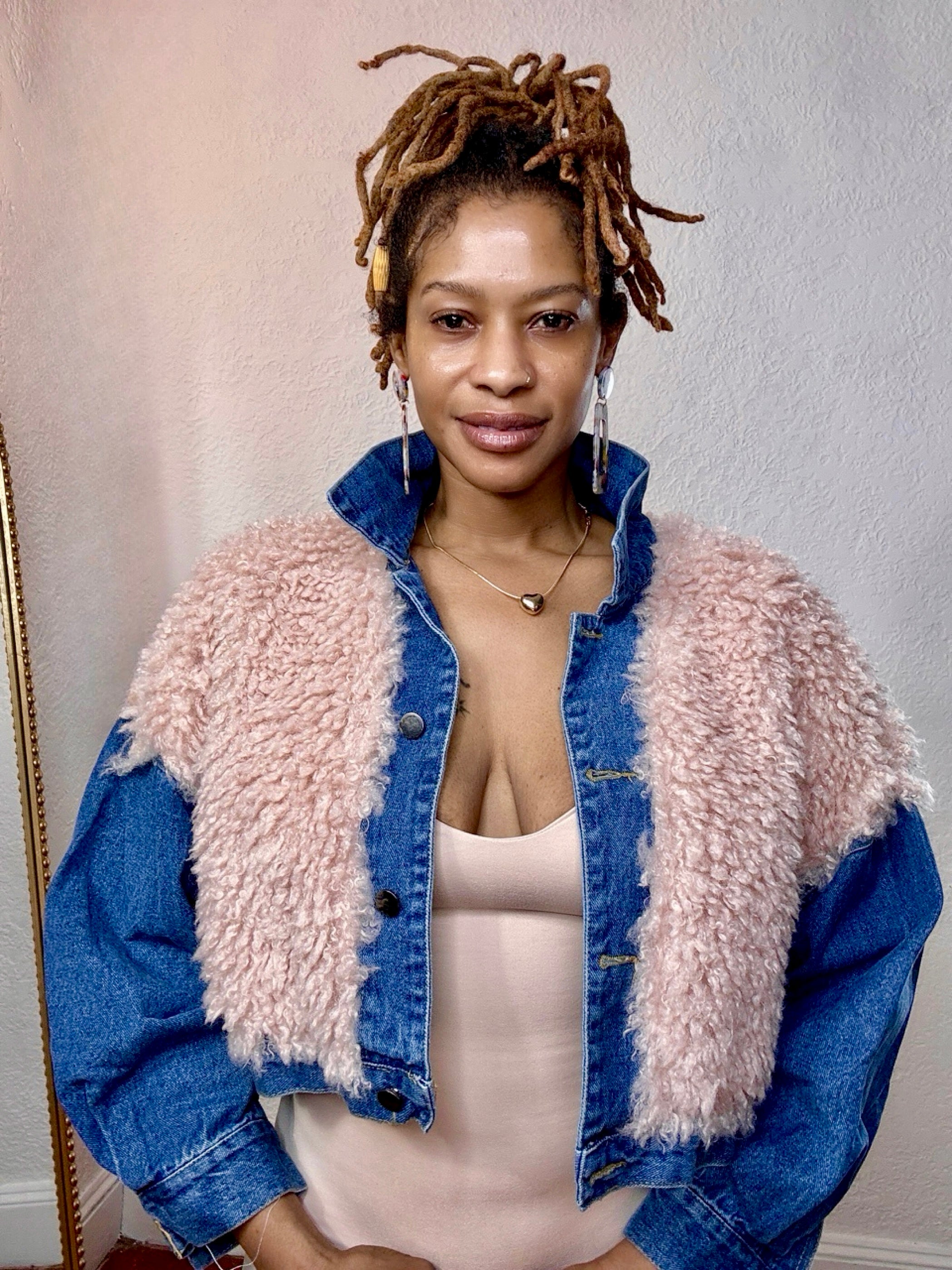 Blush Luxe Faux Fur Denim Jacket — front view showing blush faux shearling overlay on structured denim from Monologue Closets