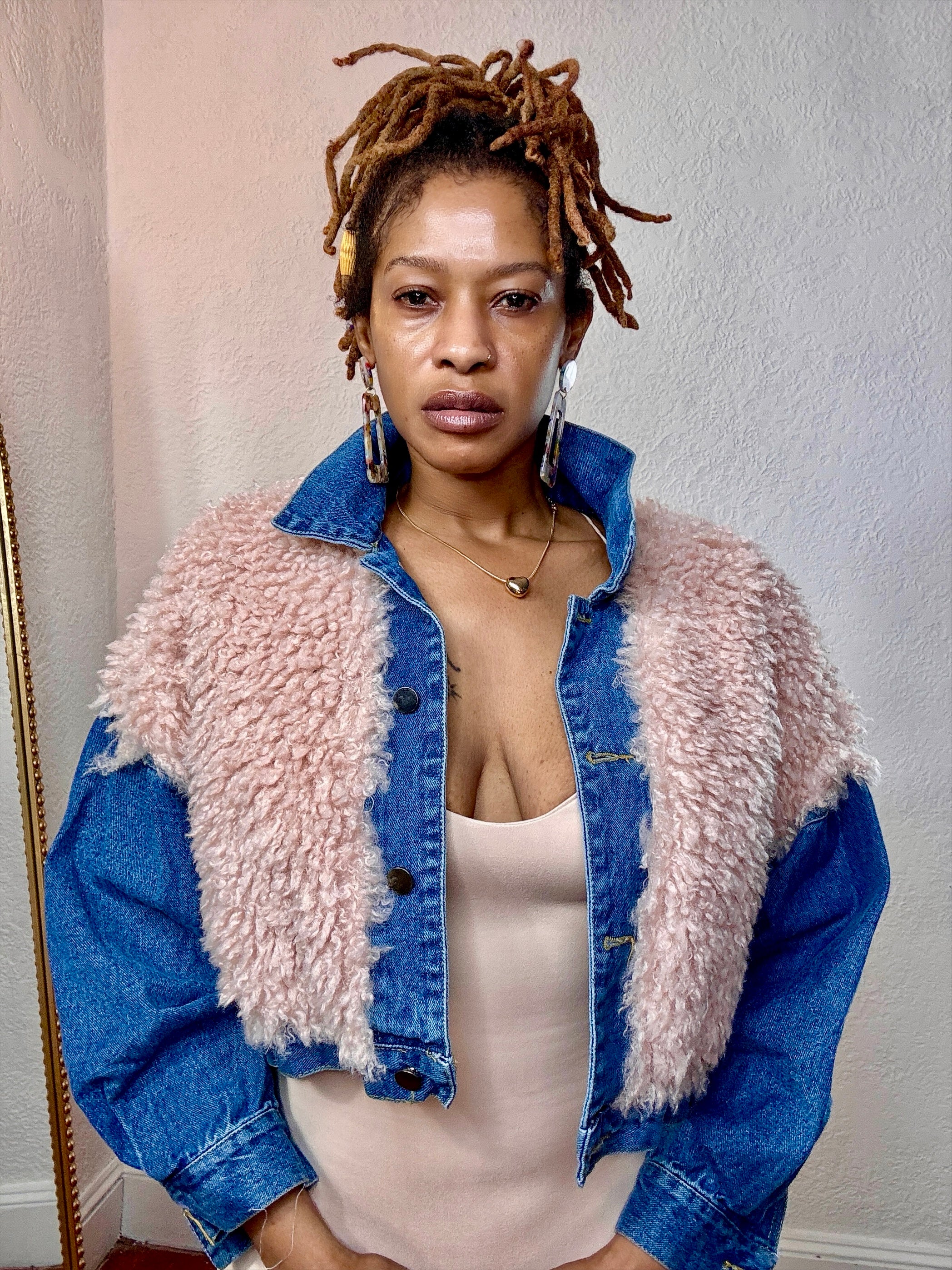 Blush Luxe Faux Fur Denim Jacket — front view showing blush faux shearling overlay on structured denim from MonologueClosets