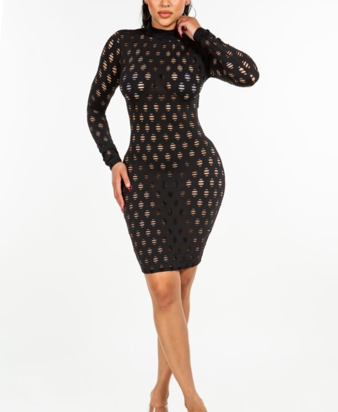 Woman wearing the Midnight Tease black cutout bodycon dress.